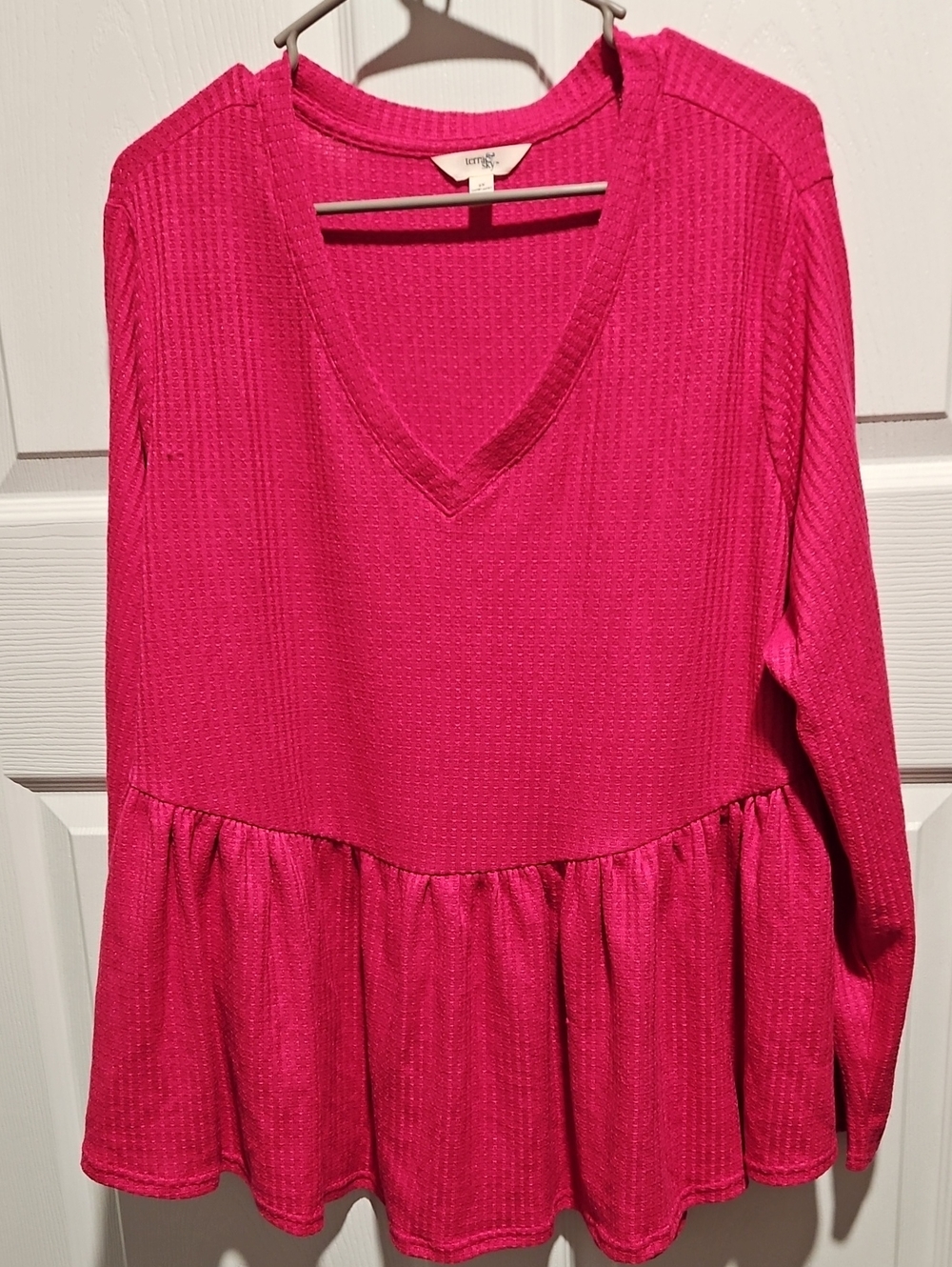 Terra & Sky V-Neck Peplum Top in Fuchsia